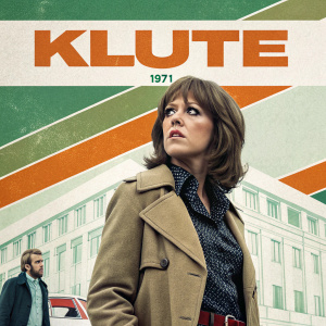 Movie poster for 'Klute', 1971. Jane Fonda, Caucasian actress, with intense gaze, stands prominently. Background features Donald Sutherland, green, orange, and white retro design.