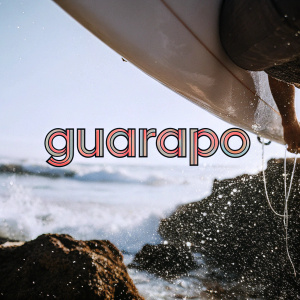 Logo for Guarapo featuring modern, stylized text in a vibrant color scheme. Bright green backdrop, dynamic shapes surrounding brand name.