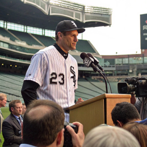 Robin Ventura, wearing a Chicago White Sox jersey with number 23, during a stadium press conference.