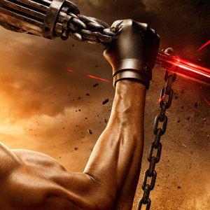 Poster for Terminator movie. Strong human arm and metallic robot arm battling amidst a fiery backdrop.