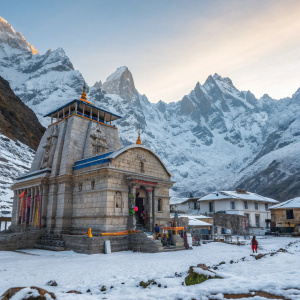 The Kedarnath Temple, nestled in the Himalayas. Dedicated to Lord Shiva. Surrounded by snow-capped peaks and frozen landscapes.
