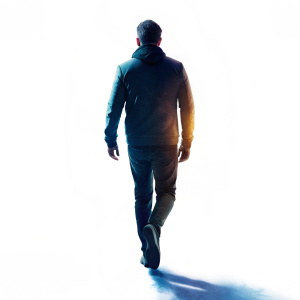 A Man sillhoutte walking on , from behind, isolated on white background