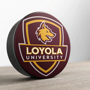 Loyola University's logo featuring a sleek, contemporary design. The maroon and gold colors highlight the shield emblem and university name.