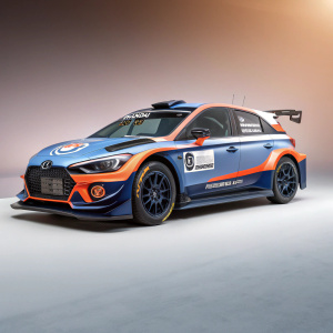 3D render of Hyundai i20 R5 rally car. Blue and orange livery, low profile design. Aerodynamic features, sponsor logos and decals visible. Set against a gradient background.