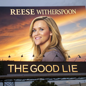 Promotional billboard featuring Reese Witherspoon. The Good Lie movie. Biblical quote and film crew credits below. Sunset backdrop.