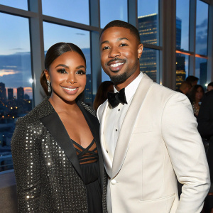 Ashanti and Michael B. Jordan at a glamorous gala. Smiling, chic attire. Large windows behind, showcasing city skyline.