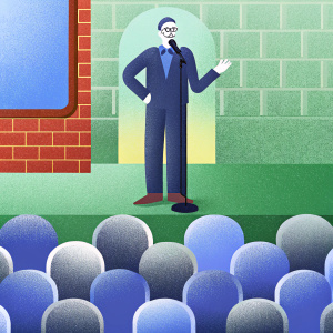 Richard Belzer, wearing a dark suit and glasses, is seen at a stand-up comedy club. He stands confidently in front of a crowd, with a brick wall background and colorful sign