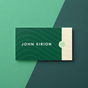 Business card for John Kirion, modern design with dark green background on one side and a lighter gradient on the other. Features name, title, email, phone number, and website.