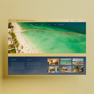 Homepage for Gran Caribe Real Resort. Modern design with blue and gold color scheme. Large beachfront image with smaller inset photos. Organized layout for easy navigation.