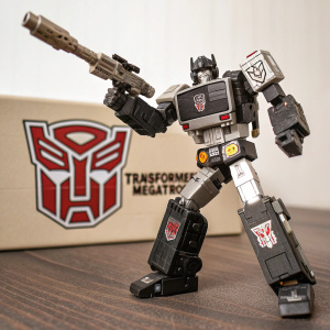 Transformer Megatron toy on eBay listing. Showing off dynamic action pose. Black and grey color scheme with metallic highlights. Transformers logo front and center.
