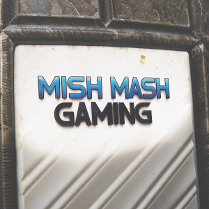 A sleek logo for gaming brand MISH MASH GAMING. Bold sans-serif typography in vibrant blue and sleek black contrasts sharply against a white backdrop, emphasizing modernity and brand identity.