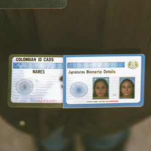Official document images featuring Colombian ID cards with names, signatures, and biometric details.