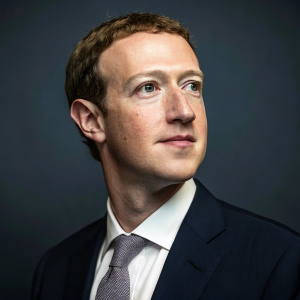 Mark Zuckerberg's LinkedIn profile picture. Dark background. Formal attire.