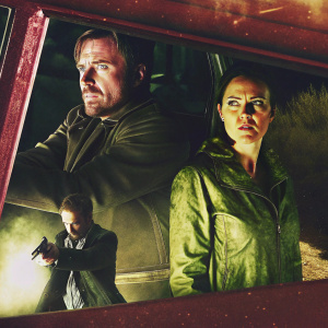 Homepage banner featuring 'Breaking Bad'. High-profile actors in dramatic poses. Color scheme is monochrome with subtle highlights