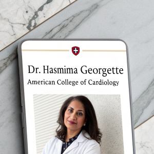 Dr. Hasmima Georgette's profile page on the American College of Cardiology website. Professional photo, brief biography, and contact information. Sleek design with clean background.