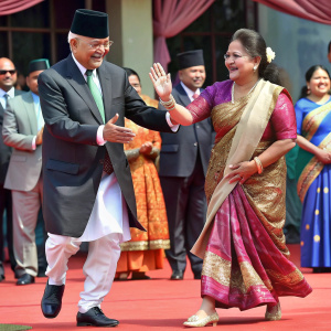 Prime Minister of Nepal “K.P Sharma Oli” dancing on the stage with “Pushpa Kamal Dahal” dancing next to “K.P Sharma Oli”
