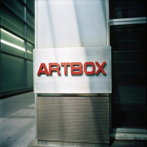 The ArtBox Inc logo, a sleek and contemporary design. The name 'ARTBOX' in angular, bold letters in bright red against a minimalist white backdrop.
