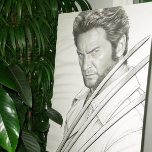 Realistic black and white drawing of Wolverine. Intense expression with prominent facial features. Close-up with minimal background.