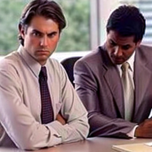 customer is not satisfied with his insurance consultant in office. They sitting together in the big and large office. We see the background of the office not only the faces