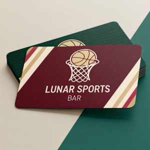 Business cards for Lunar Sports Bar. Designs include basketball hoop silhouette and team colors in dark maroon, forest green, and sand beige.