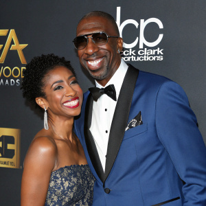 J.B. Smoove and Shahidah Omar at the Hollywood Awards Gala. Blue tuxedo, smiling