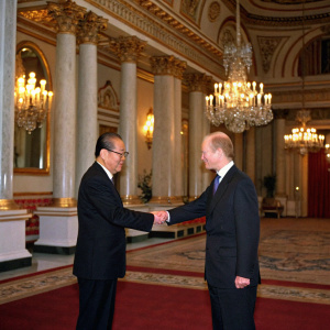 Formal diplomatic meeting. Jiang Zemin and William Hague shaking hands in ornate hall, British royal palace.