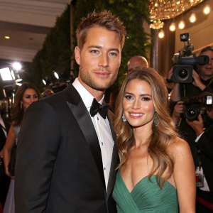 Justin Hartley and Lindsay Korman at a glamorous Hollywood party, surrounded by celebrities and flashing cameras.