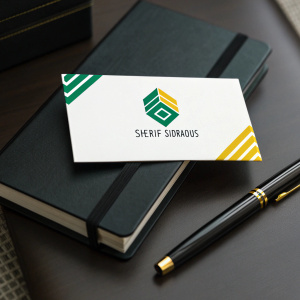 A sleek business card for Sherif Sidraous. Modern logo with green and yellow accents. Laid on a sleek, polished black surface. Professional and contemporary design.