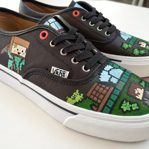 Custom Vans sneakers, featuring intricate pixel art from Minecraft. Dark faux leather surface adorned with game characters and elements
