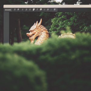 3D modeling software interface displaying an intricate, golden dragon. The dragon's design is angular with a rich, detailed golden texture. The software's toolbar and menu are visible at the top and side of the screen. Focused on the dragon's body rendering.