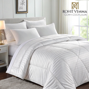 Rohit Vemma's premium bedding ad featuring the Glossy Collection's satin stripe comforter. Multiple angles showcasing texture and design.