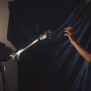 High-tech robotic arm from Alita: Battle Angel movie. Shot in studio with black backdrop.