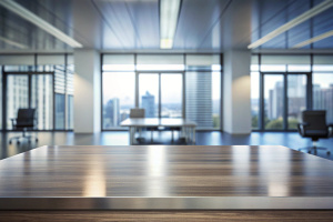 table steel top with blurred empty office room background can be used for mocking up or display product to make advertising. 