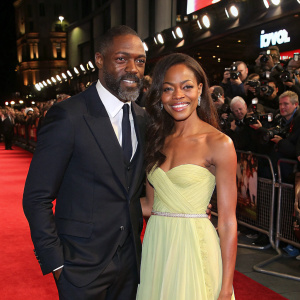 Idris Elba and Naomie Harris on the premiere of their new film. Lavish red carpet with flashing cameras and crowds