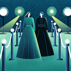 Alana Haim and Este Haim at the EE British Academy Film Awards. Alana in a green, floor-length gown, Este in a black, lace-overlay gown. They pose against a bustling red carpet, with paparazzi flashing lights and award logos visible in the background.