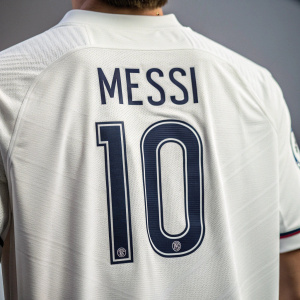 Close-up of Cristiano Ronaldo's jersey. Jersey is white, name is Messi, number 10