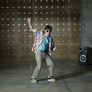J-Hope from BTS, vibrant pop art style, energetic dance moves, colorful background