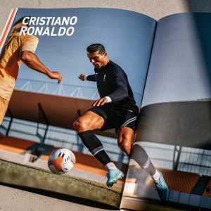 Cristiano Ronaldo featured in a vibrant magazine spread. Shown in action during a soccer match. Intense gameplay moments captured alongside quotes and stats.