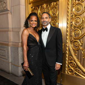 Christina Milian and Marc Jacobs attending the Met Gala. Ornate gold backdrop
