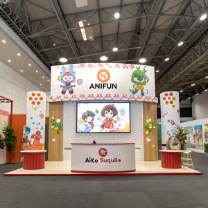 Anifun event booth designed by Aiko Suquila. Central display featuring Anifun logo and animated characters on large screen