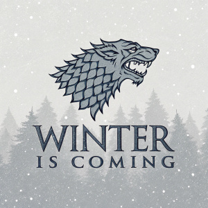 Digital art of Game of Thrones logo. Stylized wolf's head atop rugged, textured font 'WINTER IS COMING'. Muted gray color scheme. Grayscale background with subtle texture.