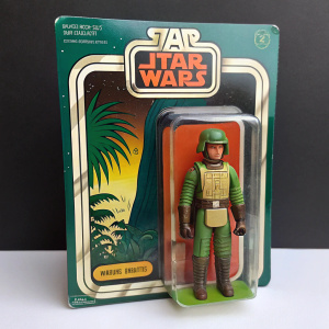 A vintage Star Wars action figure, featuring a guard from Klaatu Skiff in Return of the Jedi. Detailed packaging with original Kenner branding and pricing.