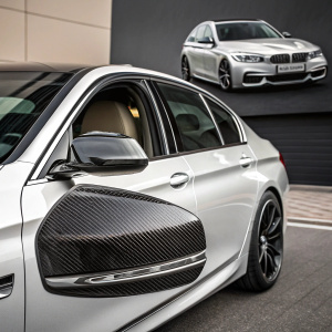 Premium carbon fiber rear view mirror covers for BMW 5 Series F10/F11/F18 Pre-LCI. Black and white design with textured finish.