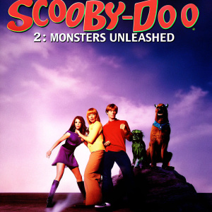 Promotional poster for Scooby-Doo 2: Monsters Unleashed featuring the main characters. Bright and colorful green backdrop.