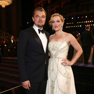 Leonardo DiCaprio and Kate Winslet at the Met Gala. Onstage, black and white theme.
