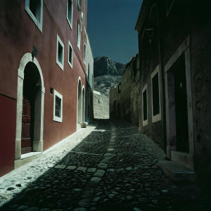 Streets of Monemvasia, Peloponnese, Greece. Medieval stone houses and winding cobblestone streets. Photo