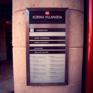Professional photography resume of Korina Villanueva. Sleek design, clear headings, modern layout. Dark background, white text. Sections include introduction, work experience, career highlights, education, skills and abilities.