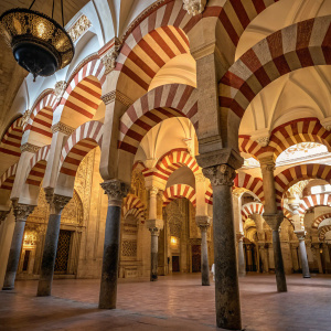 The Mezquita in Cordoba, Andalusia, Spain. Majestic arches and warm hues.