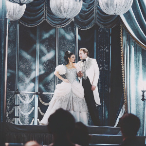 Marinelly Vaslon and Thierry Samitier performing on Broadway. Luxurious set design with gold and velvet details.