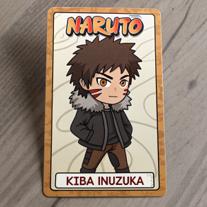 Digital illustration of Kiba Inuzuka from Naruto. Determined face, short brown hair, distinctive scar. Wearing furry dark jacket, brown pants. Cartoon style with simple background. Text: 'NARUTO' and 'Kiba Inuzuka'. Close-up character card.